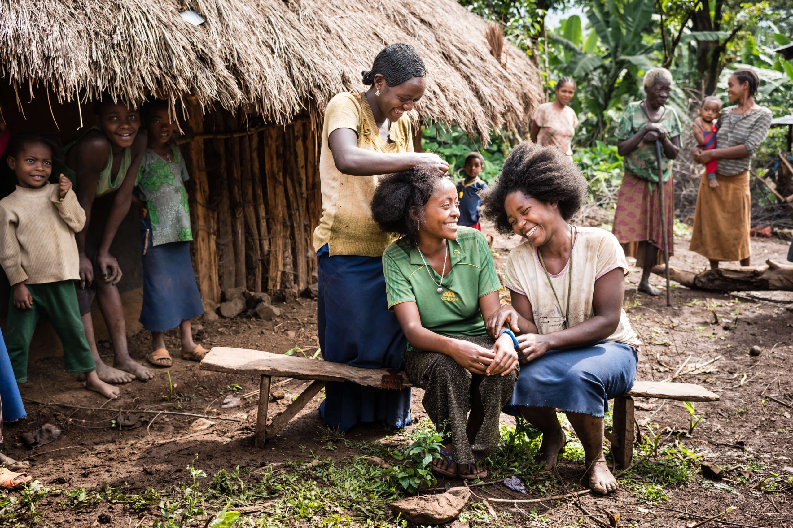 Volunteers from a humanitarian nonprofit teaching conflict resolution skills in a rural Ethiopian community.