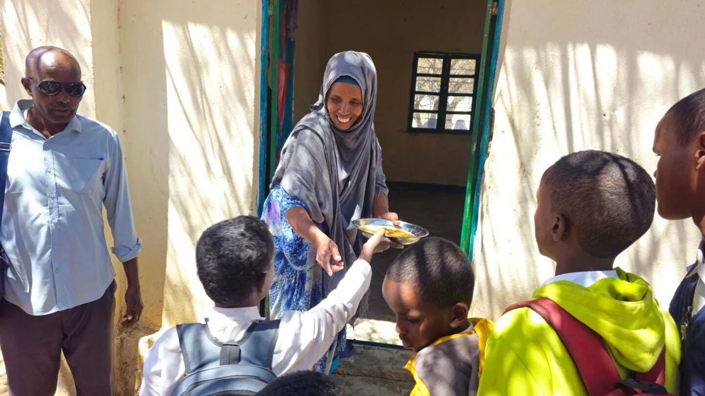 Community members participating in an international peace program to promote global peace initiatives.